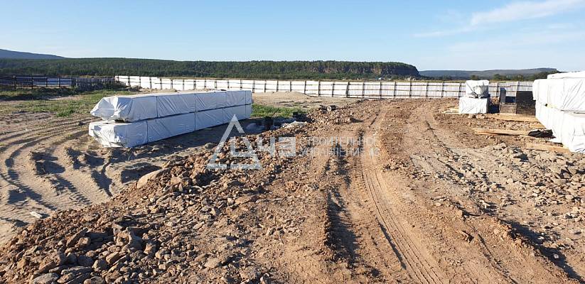 Delivery of house kits and the start of construction of the recreation center