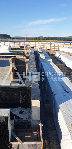 Delivery of house kits and the start of construction of the recreation center